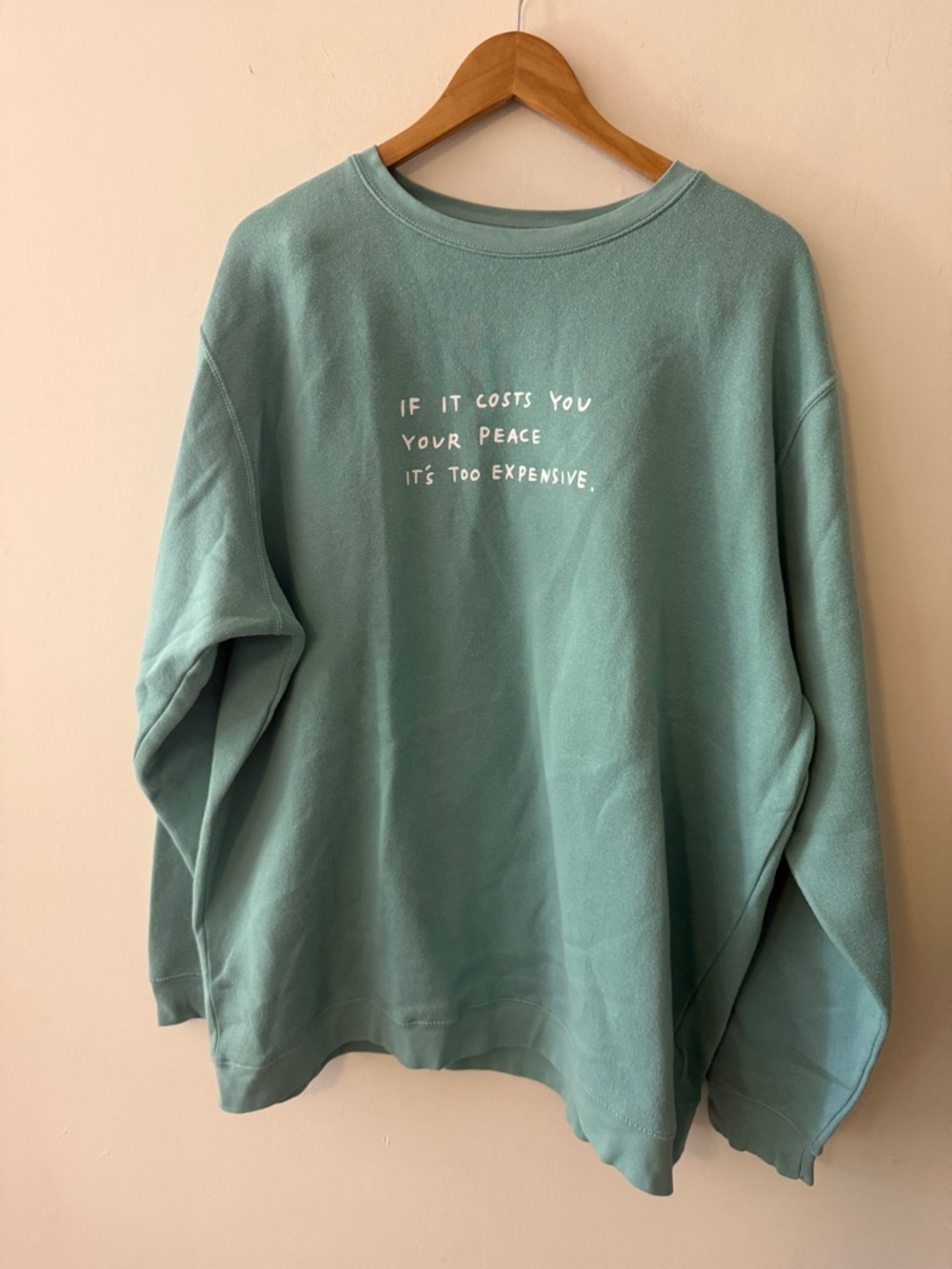 crewneck “if it cost you your peace, it’s too expensive”sage greenWEAR THE PEACE